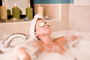 Woman-in-bubble-bath-with-candles.jpg